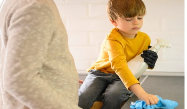 Kid cleaning the surface