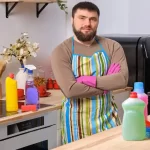 Presentation of different detergents with bearded man is standing with his arms crossed