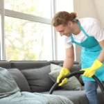 Team of janitors cleaning flat